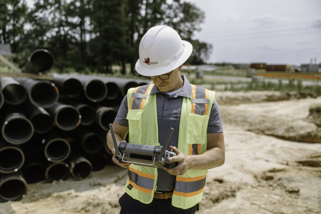 Employee flying a drone